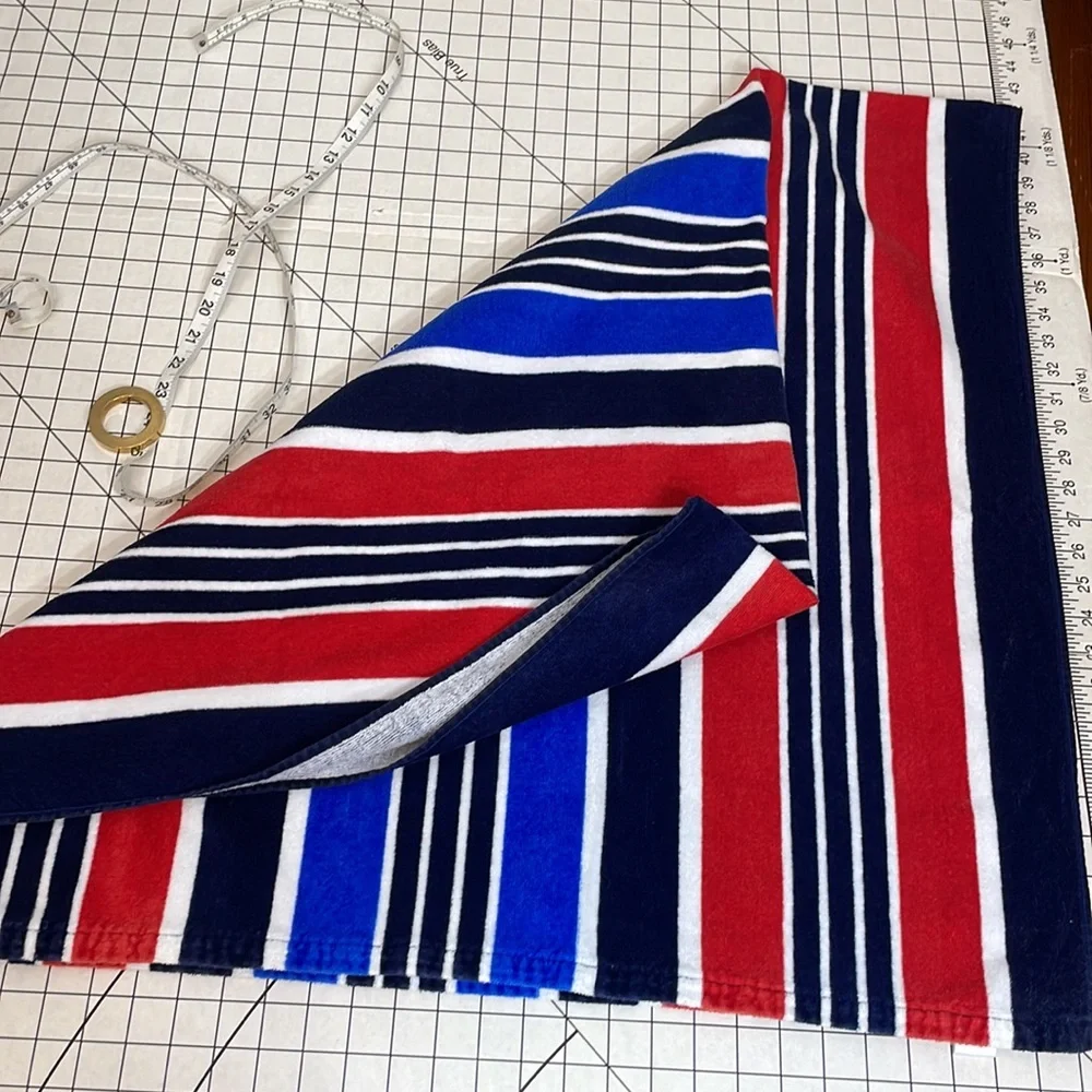 Red, white, blue striped terry-cloth beach towel